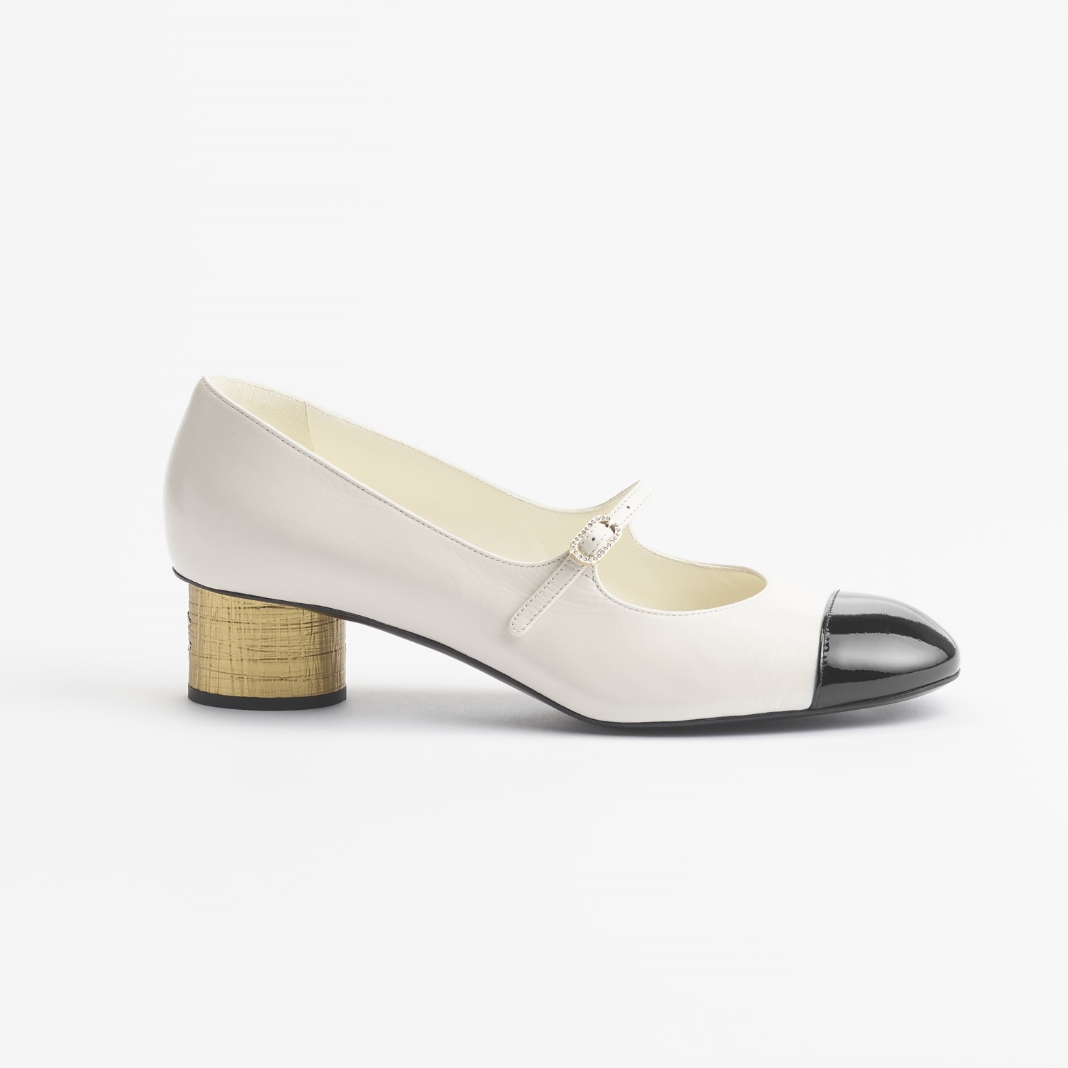 MARY JANES, IVORY AND BLACK